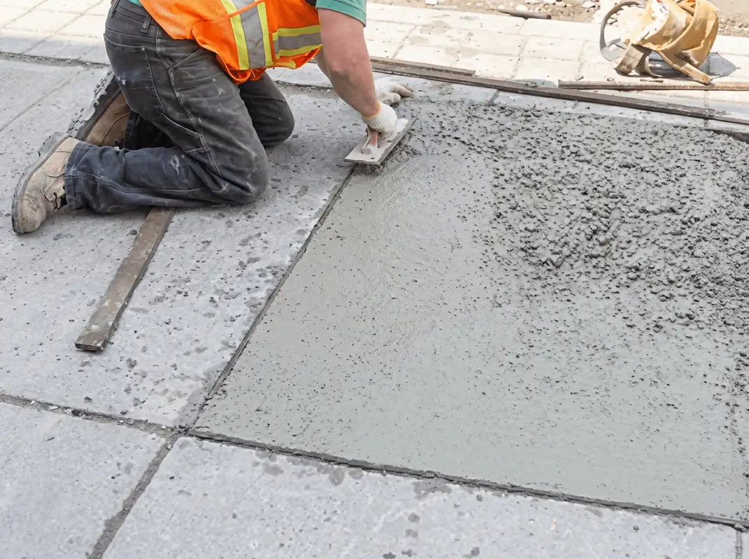 Professional repairing a concrete floor in San Diego, CA